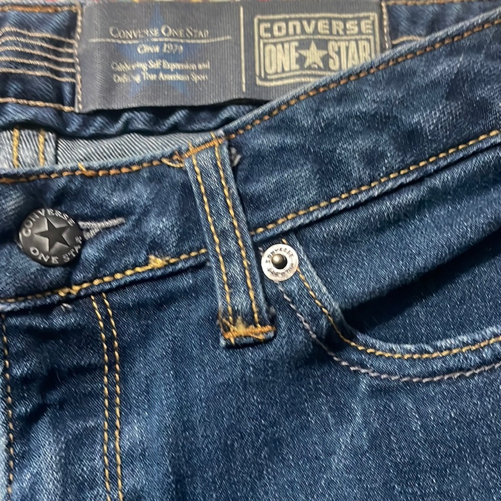 Converse boot, cut jeans, size 8